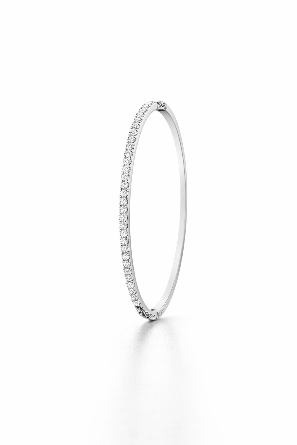 PULSERA RÍGIDA DE PLATA 925 CON CARRIL DE CIRCONITAS BRILLANTES